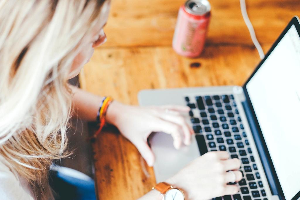 Woman meditating outdoors with sunrise